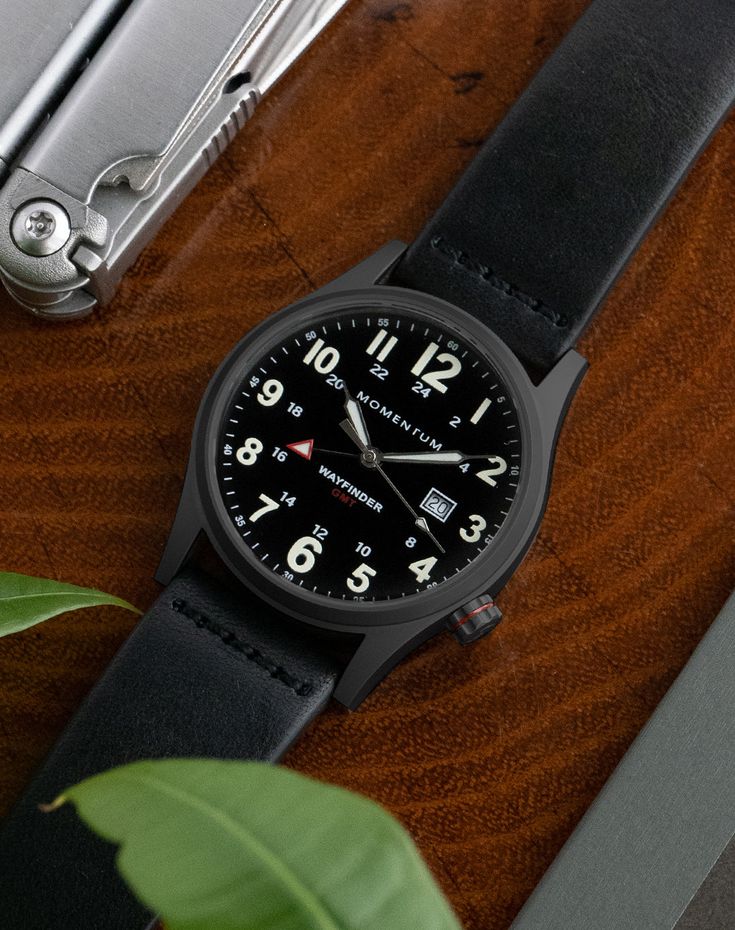 Our Wayfinder GMT is our premium tactical field watch made to accompany you anywhere. It boasts an anti-reflective sapphire crystal, 100-meter water resistance, and a screw-down crown in a 40mm black-ion plated titanium case. And thanks to SuperLuminova hands and dial markings, this watch is ultra-legible. Outdoor Watch, Field Watches, Tactical Clothing, Military Watches, Perforated Leather, Military Inspired, Stitching Leather, Watch Collection, Black Watch