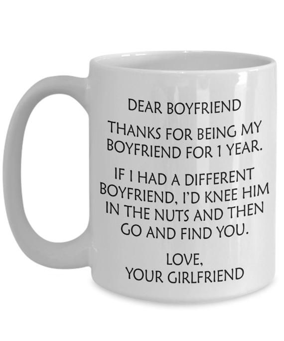 a white coffee mug with the words dear boyfriend and i love your girlfriend on it