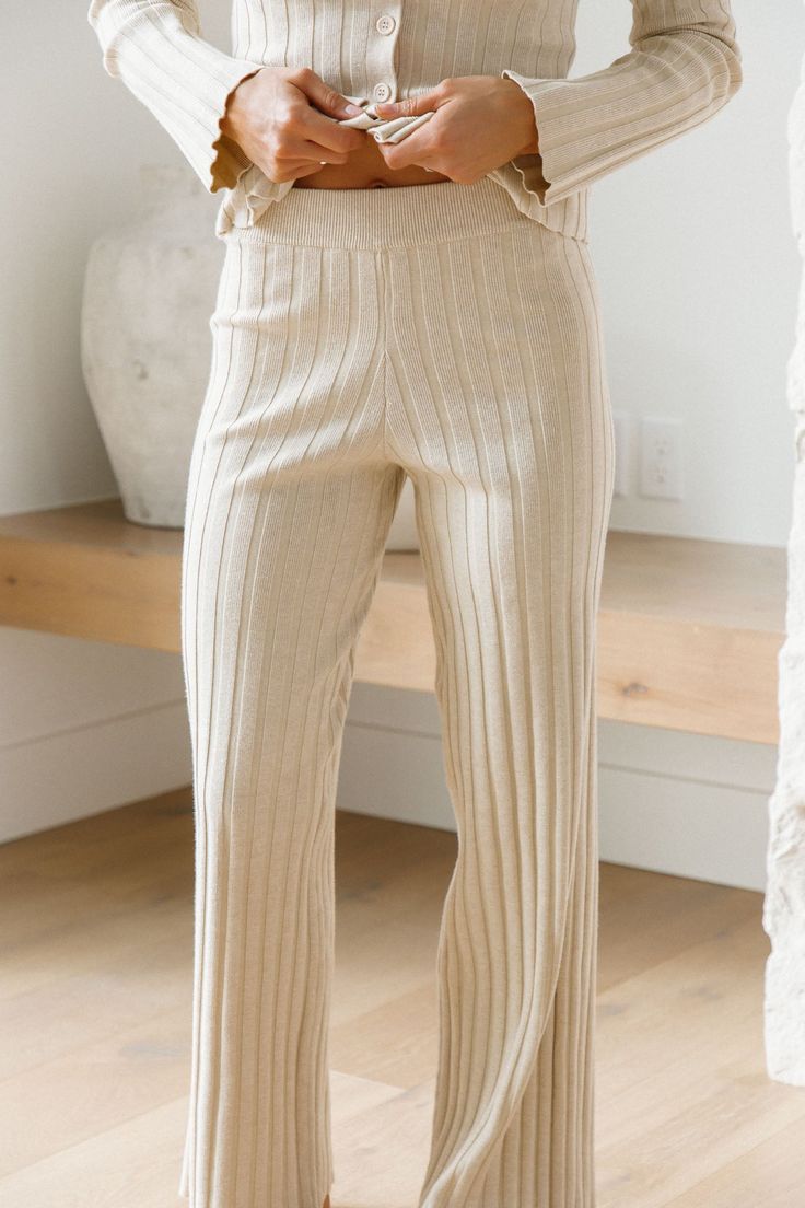 Beige in color Ribbed pants Wide-leg Full length Elasticized waist 52%Rayon, 29% Polyester, 19% Nylon Ashleys height is 5’6", wearing size x-small, her measurement are: chest 34", waist 26", & hips 36" Hoodie Model, Ribbed Pants, Long Pencil Skirt, Evening Dresses Elegant, Puff Sleeve Blouse, Knit Hoodie, Hendrix, Knit Pants, Sweater Set