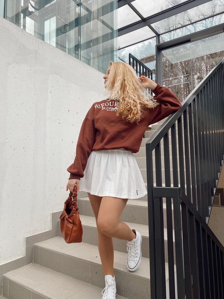 Tennis skirt, white tennis skirt, brown pullover, brown ootd, brown outfit, fashion 2021, brown fashion, fashion trends 2021 Brown Top Outfit, Brown Ootd, Thrift Inspo, Tennis Skirt Outfit, White Tennis Skirt, Knitted Jacket, Tennis Skirts, Brown Outfit, Brown Skirts