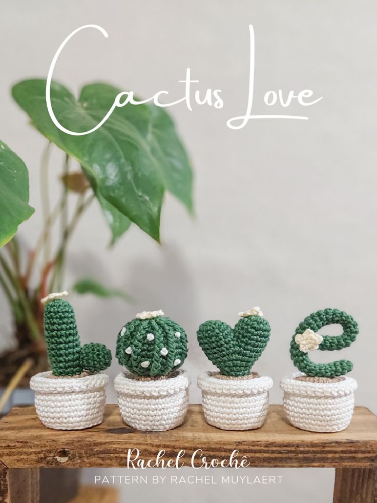 three crocheted cactus in small pots with the words cactus love written across them