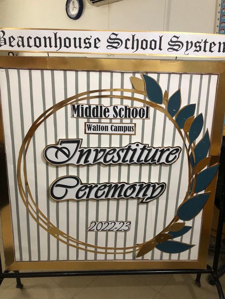 a sign for the middle school investment ceremony