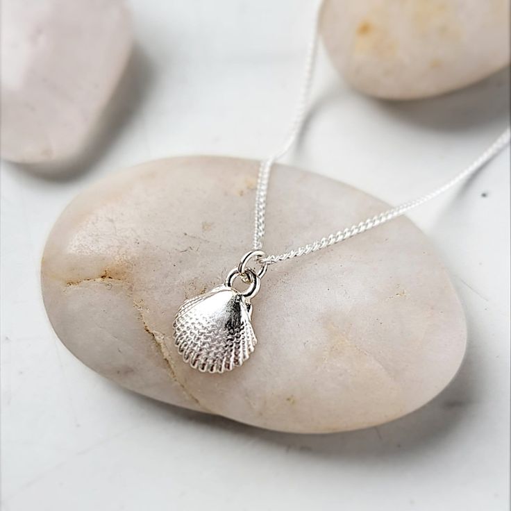 Necklace with a pendant - seashell. Made of sterling silver 925, gold plated silver or rose gold plated silver. size of the pendant: h: 11 mm w: 8,50 mm Shell Charm Necklaces For Gift, Elegant Shell Charm Necklaces For Gift, Elegant Shell Charm Necklace For Gift, Elegant Shell Charm Necklace As Gift, Elegant Shell Pendant As A Gift, Elegant Shell Pendant As Gift, Elegant Shell Pendant For Gift, Elegant Sterling Silver Shell Jewelry, Elegant Shell Necklace With Lobster Clasp As Gift