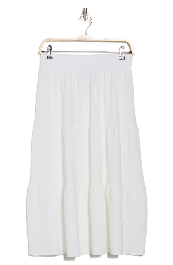 When the sun is shining, there's nothing better than a lightweight and flowy midi skirt crafted in a tiered silhouette. 31" length (size Small) Elastic waist 98% polyester, 2% spandex Machine wash, line dry Made in the USA Tiered Lined Maxi Skirt For Brunch, Lined Tiered Maxi Skirt For Brunch, Relaxed Tiered Skirt For Brunch, Flowy Tiered Skirt With Layered Hem, Flowy Tiered Skirt For Brunch, Relaxed Tiered Maxi Skirt With Layered Hem, Flowy Tiered Maxi Skirt For Spring, Chic Relaxed Tiered Skirt, Flowy Tiered Maxi Skirt For Brunch