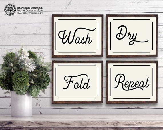 three black and white wall art prints with the words wash, dry, fold, repeat