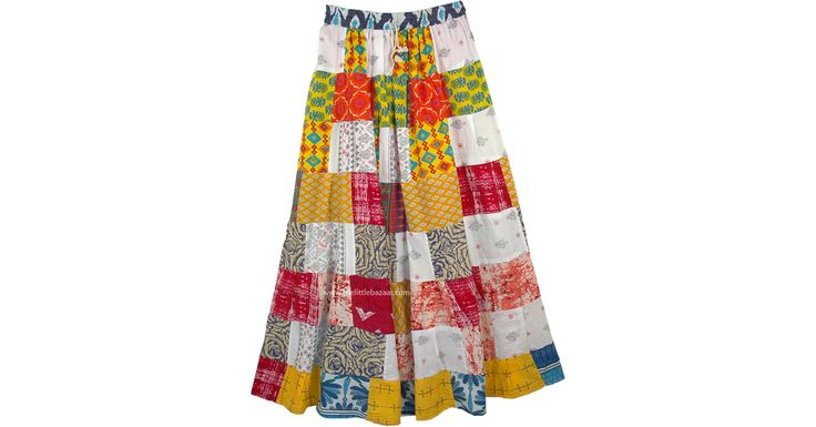 a multicolored skirt hanging on a hanger in front of a white background