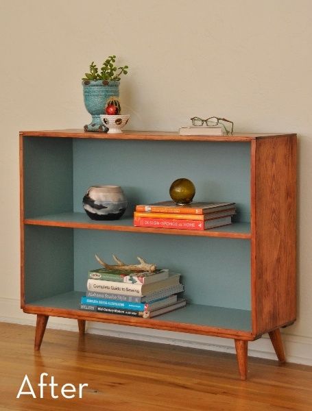 a book shelf with books on top of it