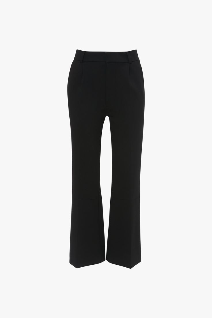 Immaculately tailored trousers are part of the Victoria Beckham brand DNA. Designed to reveal a flattering hint of ankle, these smart trousers have a contemporary kick hem for a more feminine take on the classic black pant. Front and back leg creases have a leg-lengthening effect, while discrete side pockets and welt pockets at the back reinforce the minimalist aesthetic. Styled with the Twist Detail Jersey Top, Frame Belt, High Heel, Frame Stud Earrings & the Mini Chain Pouch With Long Strap Vi Smart Trousers, Minimalist Aesthetic, Jersey Top, Tailored Trousers, Victoria Beckham, Welt Pockets, Welt Pocket, Classic Black, High Heel