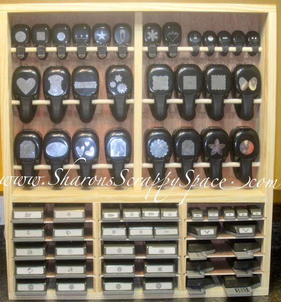 a wooden display case filled with lots of different types of electronic gadgets and buttons