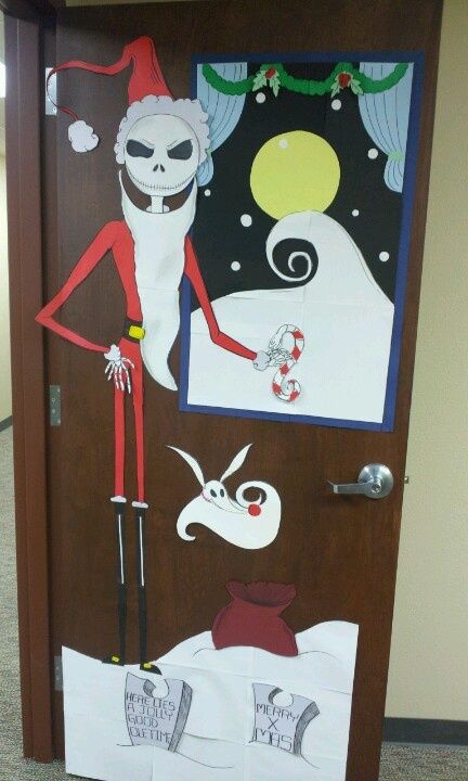 the door is decorated with paper machs and artwork on it, as well as an elf