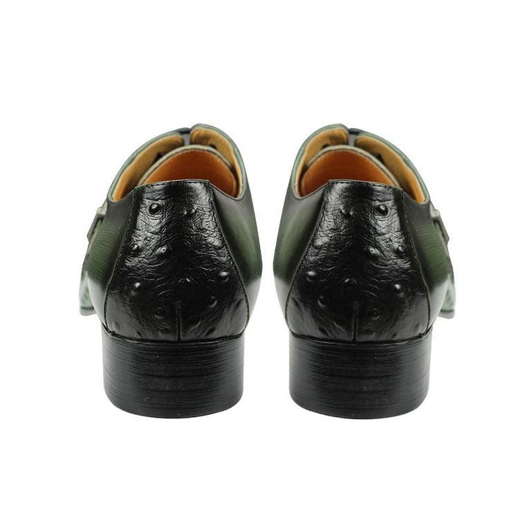 Men's British Carved Oxford Shoes. These British-inspired, fashion-forward oxford shoes boast a striking blend of green and black tones. The intricate carved details and pointed toe design exude sophistication and elegance. With their trendy lace-up closure, these shoes are perfect for formal occasions and office settings. Upper Material: Genuine Leather Pattern Type: Print Outsole Material: Rubber Lining Material: PU Feature: Height Increasing Closure Type: Lace-up *Note Delivery Time: Due to t Green Wingtip Leather Shoes For Derby, Green Dress Shoes For Derby With Round Toe, Green Round Toe Oxfords For Office, Green Wingtip Dress Shoes With Brogue Detailing, Green Oxfords With Brogue Detailing And Pointed Toe, Green Cap Toe Oxfords For Derby, Green Pointed Toe Oxfords With Brogue Detailing, Green Leather Sole Dress Shoes For Office, Green Formal Oxfords With Round Toe