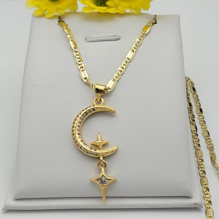 "GOLD PLATED JEWELRY Moon with Hanging Stars Pendant & Chain PENDANT 14K Gold Plated Size: 1.5\" H (Including bail) *Size Reference: A Quarter Coin is 0.95in / almost 1 inch* CHAIN 14K Gold Plated Length: 17.5 inches U.S. Seller: Shipping with tracking number. We seek to do the best in our work, if there is any problem, please let us know to fix it ASAP. God bless you!" Gold Dangle Necklaces With Moon Charm, Gold Moon Phase Star Jewelry, Gold Star Jewelry With Moon Phase Detail, Spiritual Yellow Gold Necklace With Star Charm, Gold Celestial Dangle Necklaces, Gold Star-shaped Jewelry With Moon Phase Detail, Gold Celestial Dangle Charm Necklaces, Celestial 14k Gold Pendant Jewelry, Gold Celestial Dangle Necklace