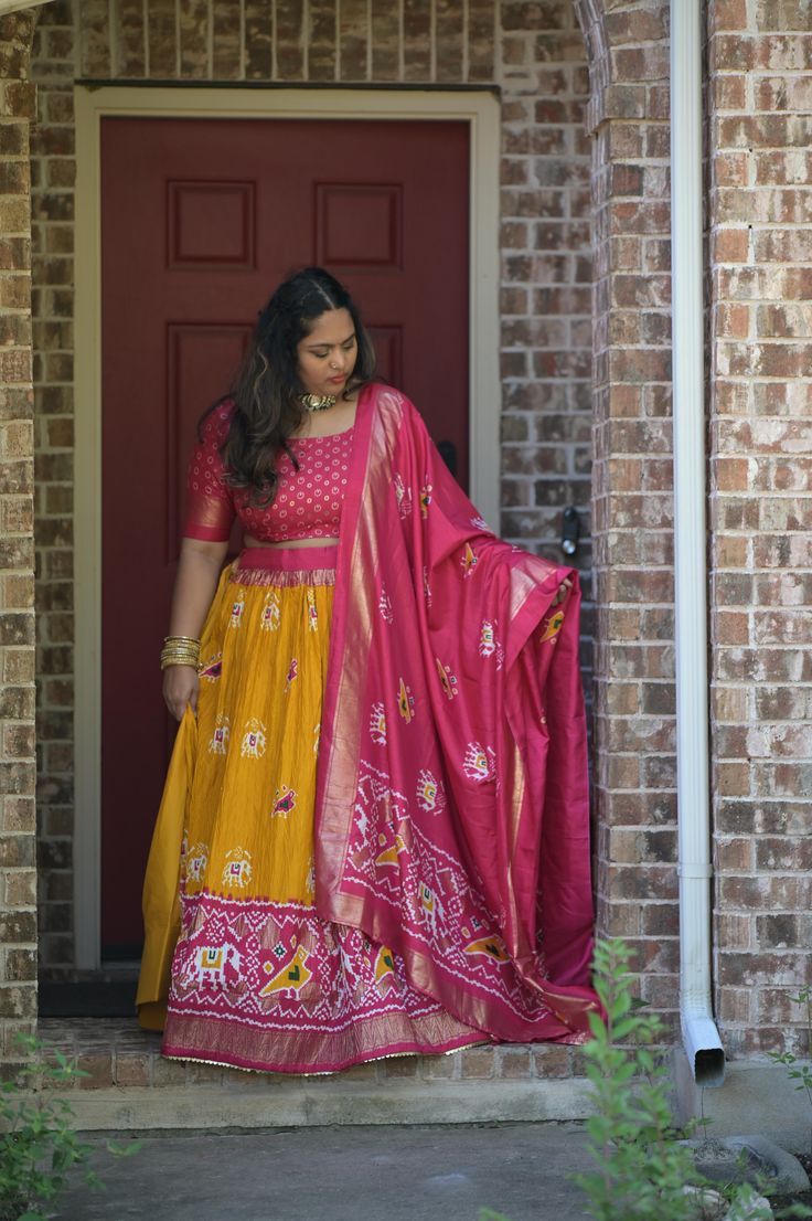 Elevate your ethnic wardrobe with our exquisite Dola Silk Lehenga. This luxurious ensemble combines the rich texture of Dola silk with the timeless beauty of Kalamkari art, making it perfect for festive occasion and wedding Blouse will have 3 to 5 inches of extra allowance Model is wearing size XL or 42 size. Disclaimer:The actual color may vary slightly due to different screen calibration.Since this product is handwoven, there might be slight irregularities and unevenness in the weave, pattern or selvedge. But isn't it wonderful that nobody else will ever own this beauty, handcrafted just for you Festive Slub Silk Sharara With Pallu, Slub Silk Sets With Dori Work For Wedding, Bollywood Style Slub Silk Salwar Kameez With Pallu, Navratri Slub Silk Sets With Dori Work, Festive Slub Silk Traditional Wear With Dupatta, Slub Silk Wedding Sets With Dori Work, Anarkali Slub Silk Choli For Festivals, Navratri Silk Palazzo Set With Traditional Drape, Navratri Slub Silk Traditional Wear With Dupatta