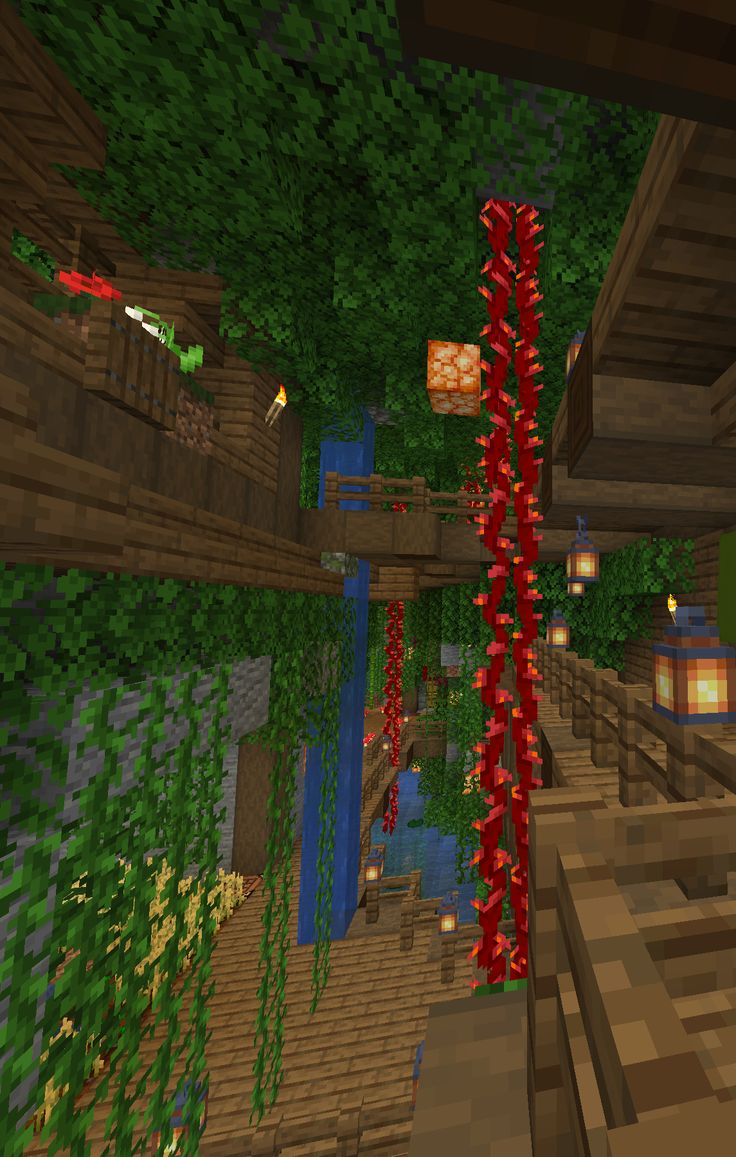 the interior of a minecraft house with red ribbons hanging from the ceiling and trees in the background