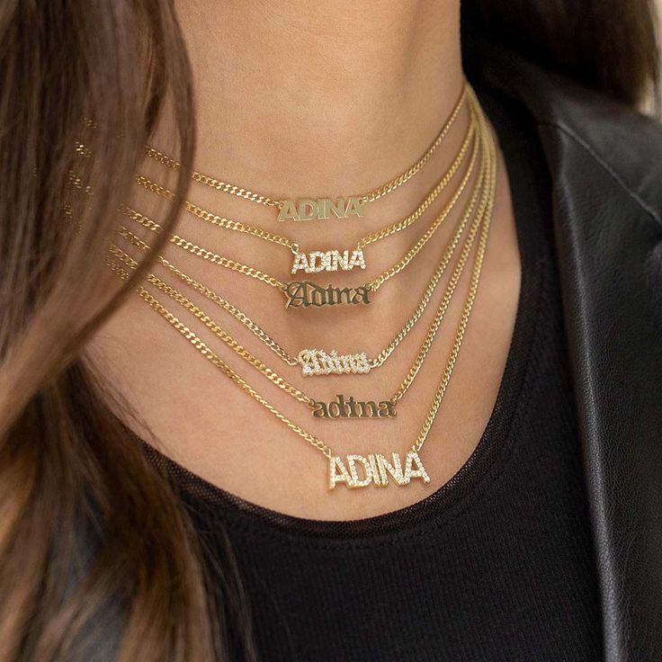 Create a truly personable look with Adina Eden's Mini Nameplate Choker, crafted with an intricate chain and a chic mini upper-case block letter nameplate. Personalize this gorgeous choker with your name or any other lettering of your choice to design a true one-of-a-kind piece particularly when you rock it with a funky t-shirt and a few link necklaces for a lively look no matter where you go. Product Details Made from Sterling Silver Gold Plated Upper-Case Block Letters Nameplate Height: 5 MM Le Name Choker, Customized Necklace, Sideways Initial Necklace, Diamond Initial Necklace, Flower Baskets, Necklace Name, Block Letters, Hanging Flower, Nameplate Necklace