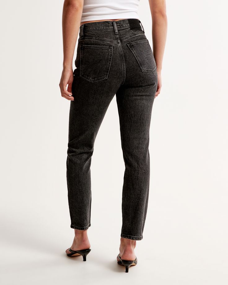 On-trend high rise mom jeans in our all-day comfort stretch denim, with a black wash and distressed hem. Everyday Washed Black Mid-rise Jeans, High Rise Washed Cropped Jeans For Everyday, Chic High Rise Washed Black Jeans, High Rise Mom Fit Cropped Jeans For Everyday, High Rise Washed Black Cropped Denim Jeans, High-rise Washed Black Cropped Jeans, High Rise Washed Black Cargo Jeans, High Rise Washed Black Bottoms For Everyday, High Rise Washed Black Jeans