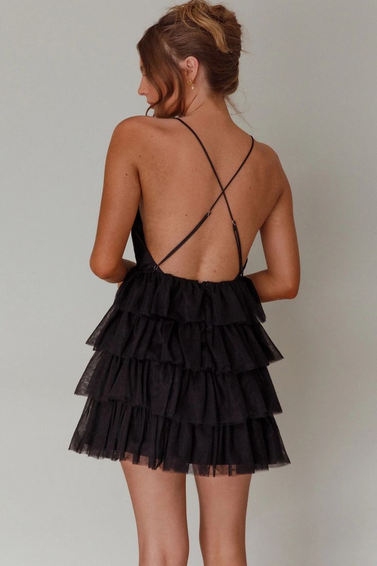 Shop the Auguste Tiered Frill Mini Dress Black | Selfie Leslie Flirty Backless Dress With Ruffle Hem, Backless Ruffle Hem Dress For Brunch, Backless Brunch Dress With Ruffle Hem, Backless Ruffle Mini Dress For Date Night, Backless Mini Dress With Ruffles For Date Night, Flirty Tiered Dress With Tie Back, Prom Mini Dress With Ruffled Straps And Details, Evening Tiered Mini Dress With Ruffle Hem, Backless Mini Dress With Ruffles For Brunch