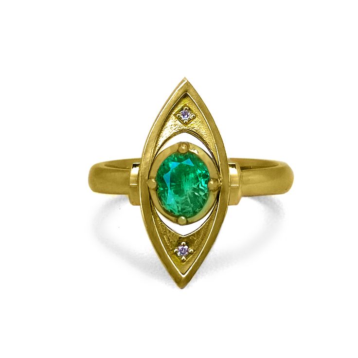 18K GOLD EMERALD RING This striking 18-karat ring with bright and lively 0.74-ct "roval" emerald is a one-of-a-kind creation. It exudes strength and wisdom. After all, according to ancient lore, emeralds endow you with the power to tell truth from deception. Think of it as your third eye! Made with love in Montreal. Details of this Emerald Statement Ring by K8 Jewelry 18K gold 20 mm long (approx. 3/4 inches) 0.74-carat Afghan emerald (Panjshir Valley), roval-shaped Size 7 (can be adjusted) 4 x 1-point post-consumer VS diamonds AFGHAN EMERALDS Learn more about Panjshir emeralds Want to know more what makes these emeralds so special? This article published by GIA shares in-depth information on inclusions and other differentiating features. Lots of fun science in that article. Learn more abou Unique Yellow Gold Oval Emerald Ring, Unique Oval Emerald Ring In Yellow Gold, Heirloom Marquise Emerald Ring, Heirloom Style Emerald Open Ring In Yellow Gold, Heirloom Emerald Open Ring In Yellow Gold, Heirloom Yellow Gold Emerald Open Ring, Unique Emerald Ring For May Birthstone, Unique Yellow Gold Emerald Promise Ring, Marquise Emerald Ring In Gold