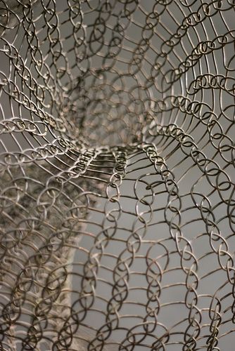 a close up view of an intricate metal object