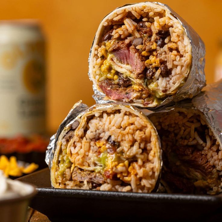 three burritos stacked on top of each other