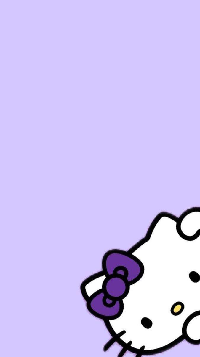 the hello kitty wallpaper is purple and has an image of a cat on it