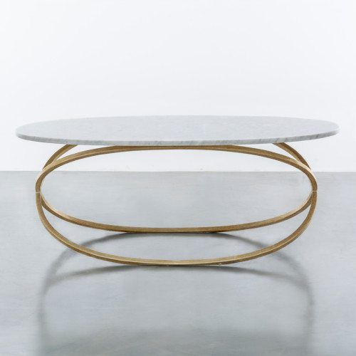 a white table with two gold rings on it's legs and a marble top