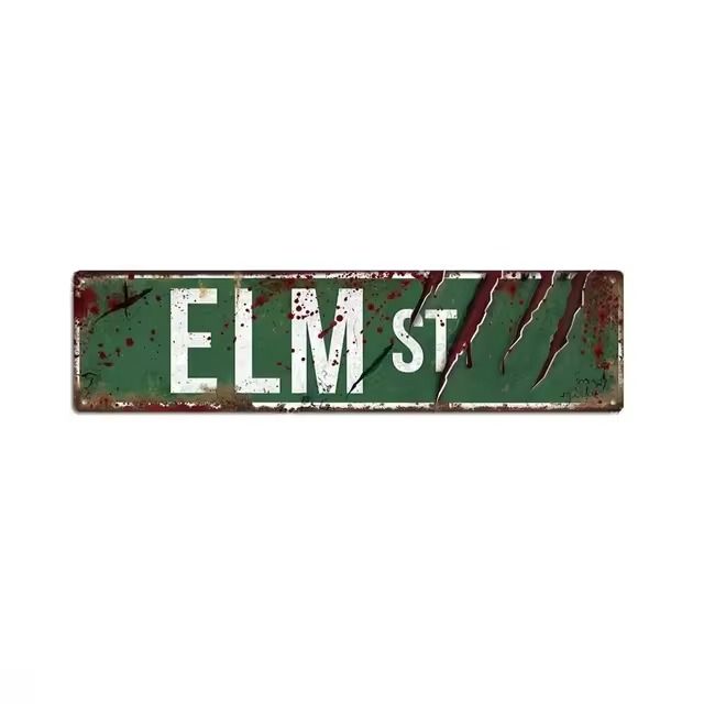 an old metal sign that says elm st