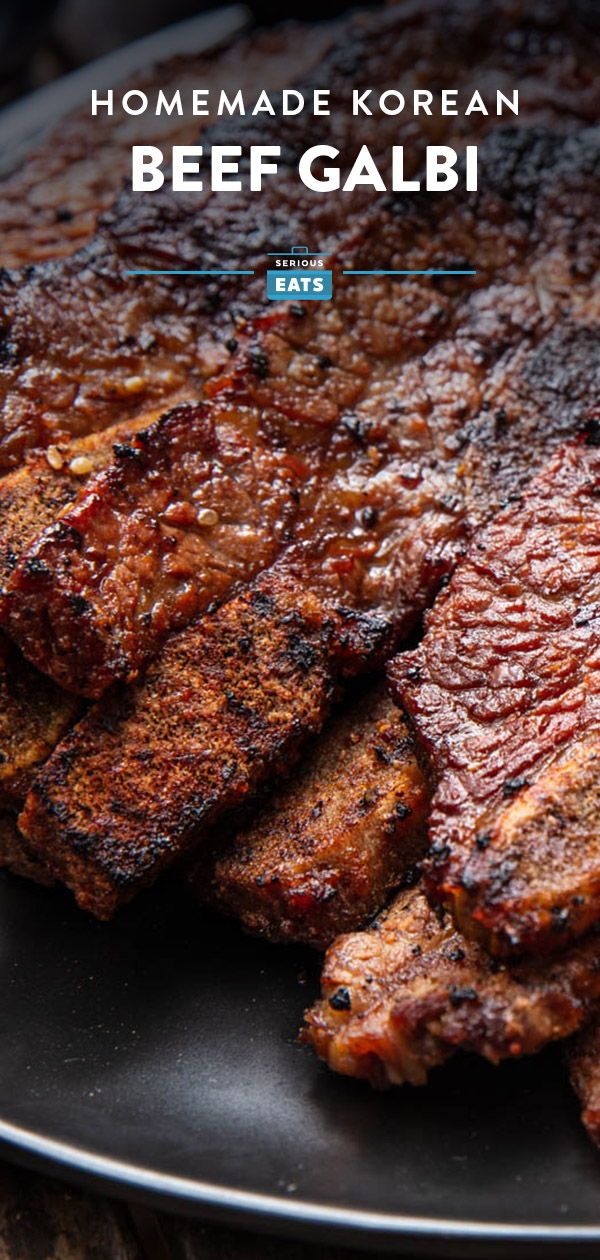 some meat is on a black plate with the words homemade korean beef gabi written below it