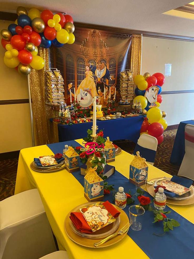 a table set up for a birthday party