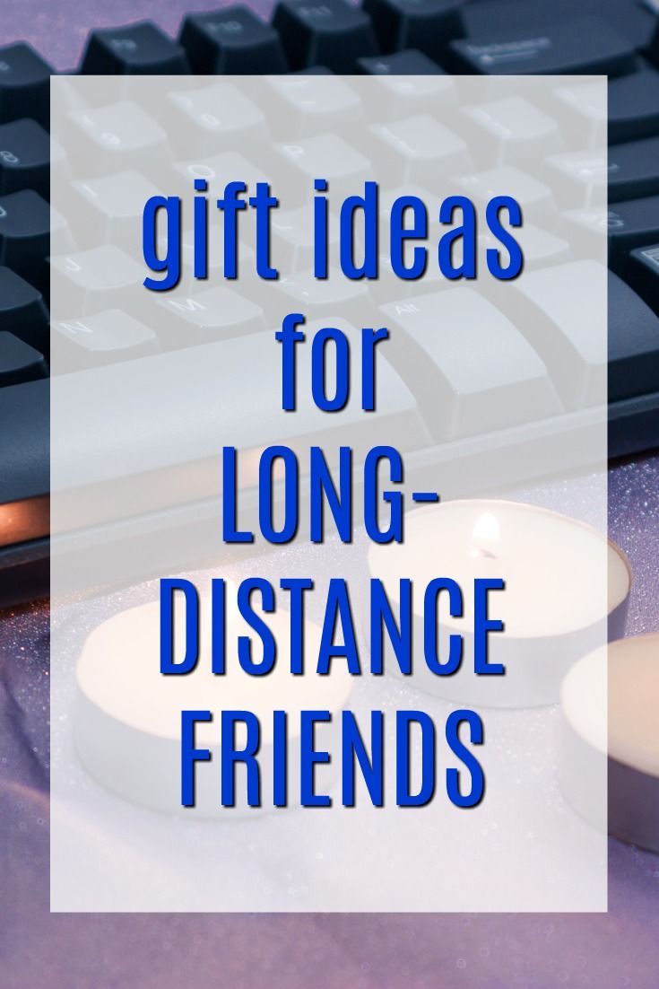 a candle sitting next to a computer keyboard with the words gift ideas for long distance friends