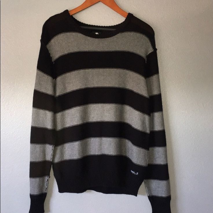 Black And Grey Striped Long Sleeve Knit Sweater Grey Black Striped Sweater Outfit, Black And Gray Striped Sweater, Black And Blue Striped Sweater, Black And Gray Clothes, Charcoal Long Sleeve Casual Sweater, Casual Charcoal Long Sleeve Sweater, Casual Long Sleeve Charcoal Sweater, Black Urban Sweater With Ribbed Cuffs, Casual Charcoal Sweater For Winter