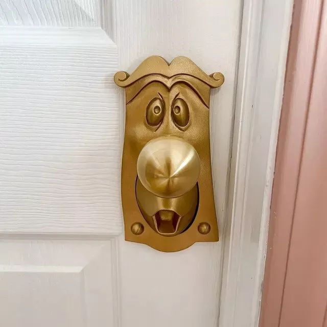 a door handle with a face on it