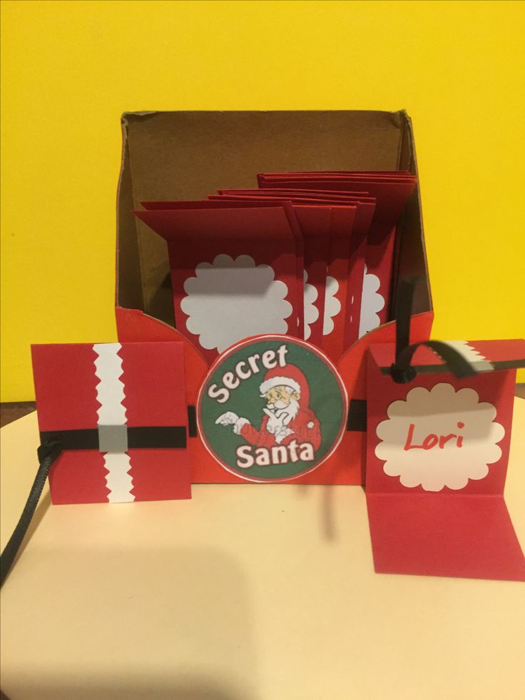 a box that has some food inside of it with santa on the front and side