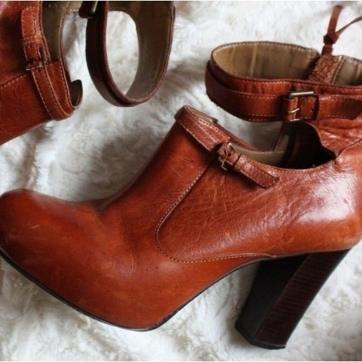 Beautiful Nwot Schuler & Sons Anthropologie Ankle Wooden Booties Schuler & Sons Durable Leather, Classic Hardware And Timeless Silhouettes. Anthropologie Schuler & Sons Tan Leather Booties. Beautiful Caramel Tan Color With Side Zipper. Leather Booties, 3.5" Heel With 1" Built In Platform In Front Bed Of Shoe. Zipper Detail, Two Decorative Buckles. Cognac Brown Color By Shuler & Sons Size 9 1/2 Fits True To Size Side Zip Leather And Synthetic Upper Leather Insole Synthetic Sole 3 1/2" Stacked Woo Chic Ankle Strap Heeled Boots For Fall, Chic Ankle Strap Heeled Boots With Stacked Heel, Ankle Strap Heeled Boots For Workwear In Fall, Fall Ankle Strap Boots With Heel Loop, Brown Boots With Heel Strap For Fall, Chic Brown Ankle Strap Boots, Brown Heeled Boots With Ankle Strap For Spring, Brown Ankle Strap Heeled Boots For Spring, Chic Brown Heeled Boots With Ankle Strap