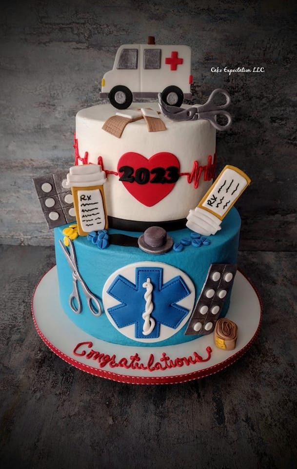 a cake decorated with medical equipment and symbols