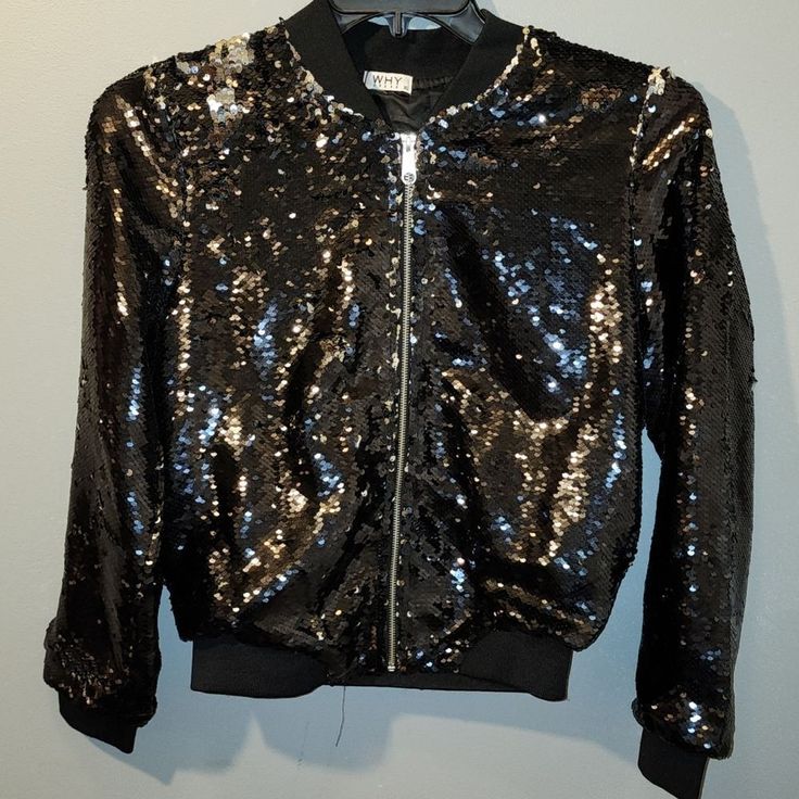 Black Sequined Fully Lined Zippered Track Jacket With Ribbed Cuffs And Collar Casual Fall Outerwear With Sequins, Winter Sequined Outerwear, Casual Sequined Outerwear For Fall, Casual Winter Outerwear With Sequins, Casual Sequined Outerwear For Winter, Trendy Black Outerwear With Sequins, Trendy Black Sequined Outerwear, Black Sequined Outerwear For Fall, Black Fall Party Outerwear