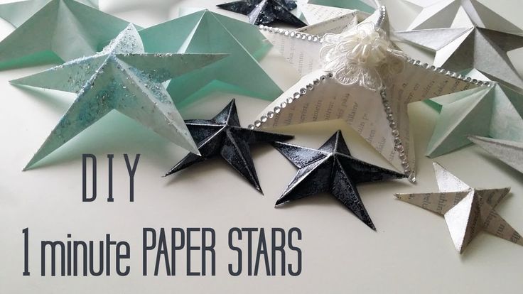 some paper stars that are on top of each other