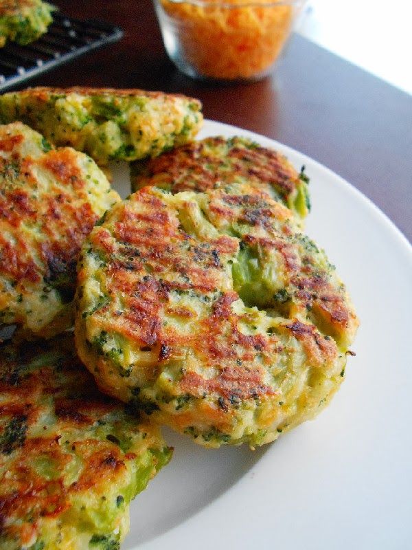 broccoli and cheese patties on a white plate