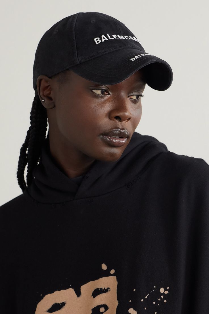 Balenciaga's latest iteration of the baseball cap has the label's logo embroidered in white threads across the front and brim. It's made from cotton-twill and has a VELCRO®-fastening tab at the back to ensure a secure fit. Cotton Baseball Cap With Logo And Curved Brim, Cotton Snapback Baseball Cap With Logo, Cotton Baseball Cap With Logo Detail, Cotton Hats With Logo Detail And Curved Brim, Cotton Hat With Logo And Curved Brim, Cotton Hats With Logo And Curved Brim, Cotton Curved Brim Hat With Logo Detail, Streetwear Hat With Logo Detail And Curved Brim, Streetwear Hat With Curved Brim And Logo Detail