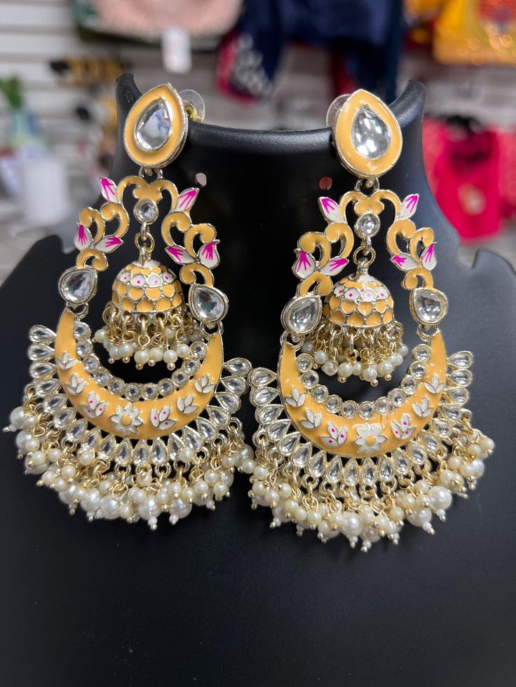 Meenakari earrings  Chandbali all Blouses come with margin inside for resizing / customization, please leave a message Luxury Meenakari Chandbalis For Designer Wear, Luxury Festive Meenakari Chandelier Earrings, Bollywood Style Kundan Chandbalis In Dual-tone, Bollywood Style Dual-tone Kundan Chandbalis, Traditional Dual-tone Danglers, Traditional Dual-tone Earrings For Diwali, Round Meenakari Chandelier Earrings In Temple Style, Round Meenakari Chandelier Earrings, Temple Jewelry, Round Meenakari Temple Jewelry Chandelier Earrings