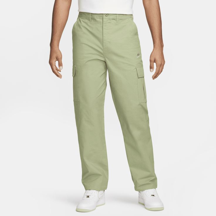 When your daily adventures call for lightweight, breathable comfort, pull on a pair of these cotton ripstop pants from our Nike Club collection. Cargo pockets offer plenty of storage while the relaxed straight-leg fit gives you a casual feel through the seat and thighs for easy, everyday wear. Nike Casual Pants With Cargo Pockets, Casual Nike Cargo Pants With Side Pockets, Functional Nike Cargo Pants With Pockets, Nike Functional Cargo Pants With Side Pockets, Nike Functional Bottoms With Cargo Pockets, Nike Functional Cargo Pants With Pockets, Nike Utility Cargo Pants With Side Pockets, Casual Nike Cargo Pants With Hip Pockets, Casual Nike Cargo Pants For Streetwear