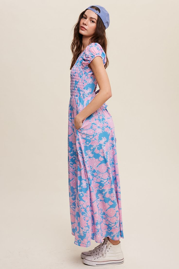 -Color: Blue/Floral -Round neck with smocked top -Cross elastic back -Puff sleeve with elastic cuffs -Hidden side seam pockets -Finished with clean hem -Lined -Imported -Runs true to size -Model is 5' 9" 31-24-34 and wearing a size Small Casual Summer Maxi Dress With Elastic Sleeves, Spring Casual Maxi Dress With Gathered Sleeves, Casual Smocked Maxi Dress With Elastic Waistband, Casual Pink Smocked Dress With Gathered Sleeves, Casual Dresses With Elastic Billowy Sleeves, Puff Sleeve Maxi Dress With Smocked Back, Casual Smocked Back Maxi Dress, Casual Maxi Smocked Dress, Billowy Casual Maxi Dress For Daywear