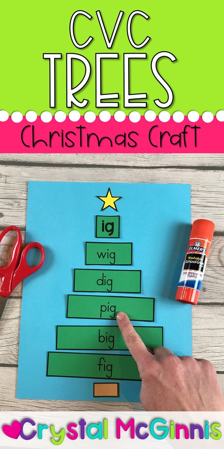 a christmas tree craft with scissors and glue on the table next to it is an image of