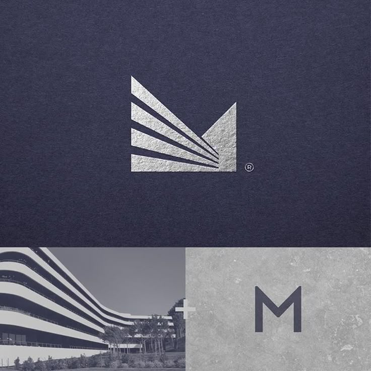 the logo for m is shown in black and white, with an image of a building behind it