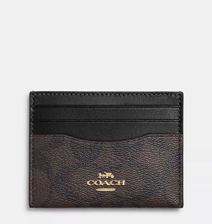 COACH CH415 Slim Id Card Case In Signature Canvas & Leather Gold/Brown Black MSRP $78 Product Details: Signature coated canvas Three credit card slots ID window 4" (L) x 3" (H) Style No. CH415 This Card case does not come with a Dust Bag. ALL ITEMS ARE GUARANTEED 100% AUTHENTIC and BRAND NEW! Your new card wallet will be carefully and neatly wrapped in tissue paper and shipped with in one day of Purchase! Check photos for colors and pattern as part of the description. Please remember due to variations in camera and phone/computer screen settings the colors may not be exactly as they appear on your screen. Message me with any questions you may have. I'll be happy to help.  Thank you for shopping with us and please check out our other listings! Classic Coach Rfid Blocking Card Holder, Classic Coach Rectangular Card Holder, Coach Black Card Holder With Rfid Blocking, Classic Coach Card Holder, Coach Black Bifold Card Holder, Coach Black Rfid Blocking Card Holder, Coach Black Card Holder With Card Slots, Classic Brown Coach Card Holder, Black Leather Coach Card Holder