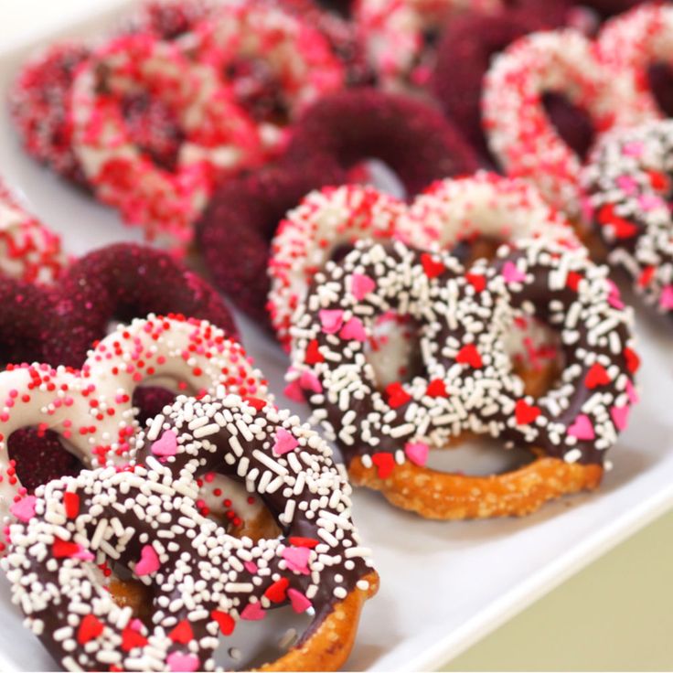 there are many donuts with sprinkles on them