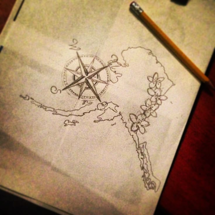 a drawing of a map with a compass on it and a pencil next to it