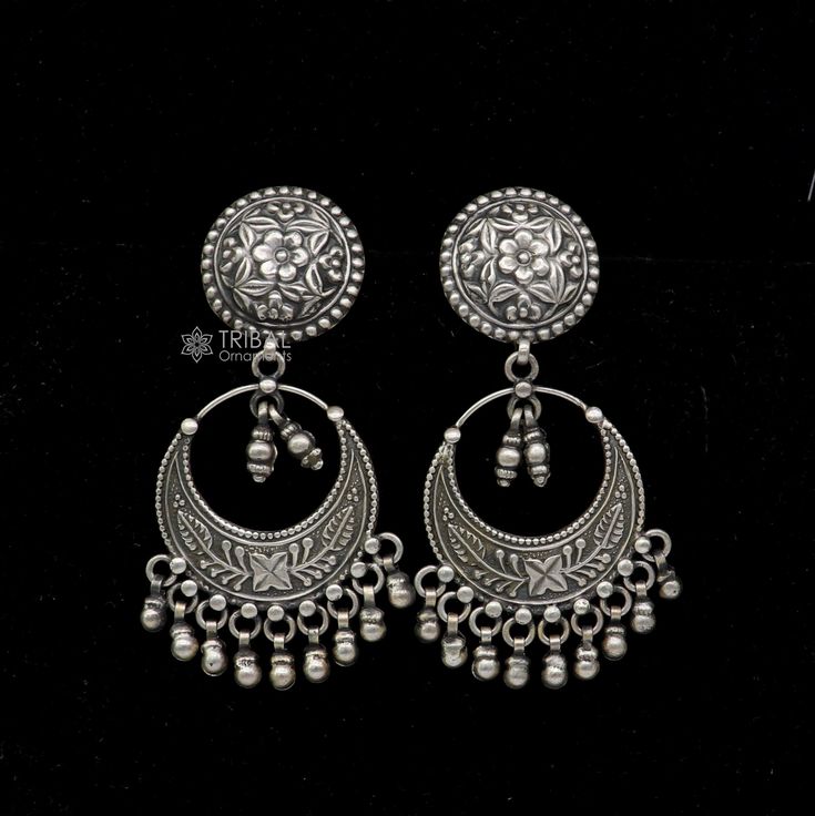 925 sterling silver handmade gorgeous stud earrings drop dangle vintage antique design earrings belly dance tribal jewelry from Rajasthan India. Metal-925 sterling silver. Type-drop dangler earrings. Length-8 centimetre approx. Width-3.5 centimetres approx. Weight-37.030 grams. Marking-925 closure-push back. Makes excellent gifting and collectible pieces. Handmade Silver Metal Bridal Earrings, Handmade Silver Bridal Earrings, Bohemian Sterling Silver Danglers For Wedding, Silver Hoop Earrings With Oxidized Finish For Wedding, Sterling Silver Chandbali Jewelry With Intricate Design, Elegant Oxidized Chandbalis, Handmade Metal Chandbalis, Round Metal Chandbalis, Silver Hoop Earrings For Festivals With Intricate Design