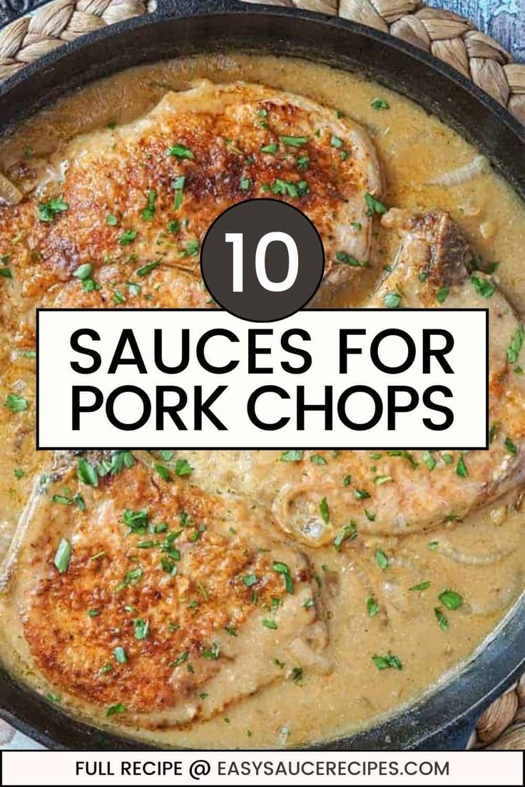 some chicken chops are in a skillet with gravy