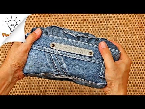 someone is holding an old pair of jeans